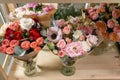 Different varieties. Fresh spring flowers in refrigerator for flowers in flower shop. Bouquets on shelf, florist Royalty Free Stock Photo