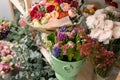 Different varieties. Fresh spring flowers in refrigerator for flowers in flower shop. Bouquets on shelf, florist Royalty Free Stock Photo