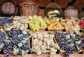 Different varieties of grapes in the wicker baskets, market place Royalty Free Stock Photo