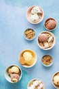 Different varieties of ice cream in ceramics bowls