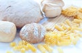 Different varieties of Italian pasta and homemade bread Royalty Free Stock Photo