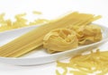 Different Varieties of Pasta : Spaghettis, Tagliatelles, Macaronis Royalty Free Stock Photo