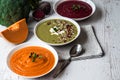 Different vegan food. Colorful vegetables cream soups and ingredients for soup. Healthy eating, dieting, vegetarian Royalty Free Stock Photo