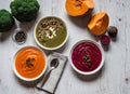 Different vegan food. Colorful vegetables cream soups and ingredients for soup. Healthy eating, dieting, vegetarian Royalty Free Stock Photo