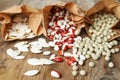 Different vegetable seeds on wooden table