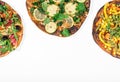 Different vegetarian pizza on white background with copy space