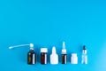 Different vials with and sprays with medicines are lined in a straight row. Top views with clear space Royalty Free Stock Photo