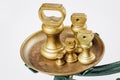 Different vintage brass weights unit standing Royalty Free Stock Photo
