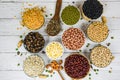 Different whole grains beans on bowl and legumes seeds lentils and nuts colorful snack background top view - Collage various beans