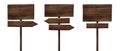 Different wooden direction arrow signposts or roadsigns made of dark wood