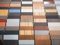 Different wooden parquette or laminate pieces samples at furniture store Royalty Free Stock Photo