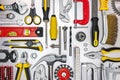 Different work tools on grey metal background. view from above Royalty Free Stock Photo