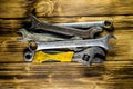 Different wrenches on a wooden table Royalty Free Stock Photo