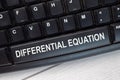 Differential Equation text write on keyboard isolated on laptop background