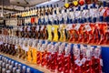 Differential focus. Small liquor bottles with various forms, for sale in traditional street market in Italy. Typical italian