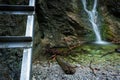 Difficul trail with ladder near the waterfall in canyon of National park Slovak paradise