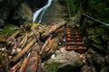 Difficul trail with ladder near the waterfall in canyon of National park Slovak paradise