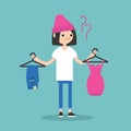 Difficult choice. Young teenage girl trying to decide what to wear Royalty Free Stock Photo