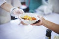 Difficult people receive free food from philanthropy through volunteers: concept of feeding and sharing