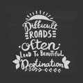 Difficult roads often lead to beautiful degtination handwriting monogram calligraphy. Black and white engraved ink art.