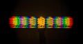 Diffraction of light from the energy-saving lamps, obtained by the grating Royalty Free Stock Photo
