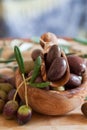 Olives on wooden background, kalamata, kalamon, green olives