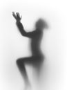 Diffuse silhouette of a praying human