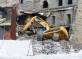 Digger brought down building Royalty Free Stock Photo