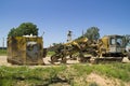 Digger digs a trench for pipe laying Royalty Free Stock Photo