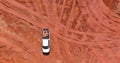 Digger on earthworks in excavator dig the trenche at construction site on arial view of earth moving heavy equipment