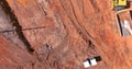 Digger on earthworks in excavator dig the trenche at construction site on arial view of earth moving heavy equipment