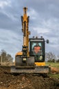 A digger moving soil