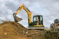 A digger moving soil Royalty Free Stock Photo