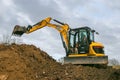 A digger moving soil Royalty Free Stock Photo