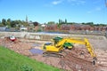 Digger working on Exeter flood defences