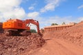 Digger on a construction site Royalty Free Stock Photo