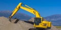 Diggers picking up dirt in Eagle Mountain Utah Royalty Free Stock Photo