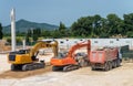 Diggers and truck in contruction site Royalty Free Stock Photo