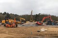 Diggers and dumper trucks on a construction site