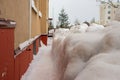 digging out walls of houses from snow in the spring, at the end of winter