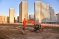 Digging the pit foundation a hole with excavator. Earthwork in excavation and backfilling of soil upto required depth is required Royalty Free Stock Photo