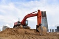 Digging the pit foundation a hole with excavator. Earthwork in excavation and backfilling of soil upto required depth is required Royalty Free Stock Photo