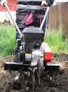 Digging In The Rain Royalty Free Stock Photo