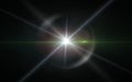 Digit lens flare with bright light in black background used for texture and material.Lens flare or Star flare in black Royalty Free Stock Photo