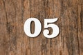 Digit zero five - White numbers on rustic wooden background Royalty Free Stock Photo