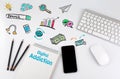 Digital Addiction. Office desk table with computer, Smartphone, note pad, pencils