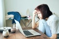 Digital addiction, woman in panic reads articles about coronavirus on Internet