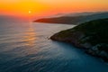 Digital Aerial view captures the breathtaking seascape during sunset Royalty Free Stock Photo