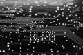 Digital AI, Artificial Intelligence or machine learning background concept, closed up of computer circuit board with solder on bl Royalty Free Stock Photo