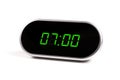 Digital alarm clock with green digits